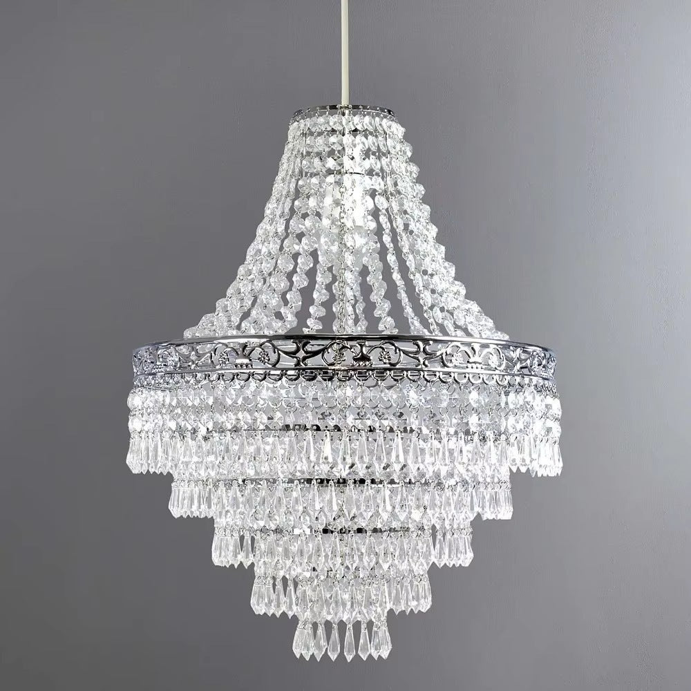 Antique crystal chandelier in chrome with five tiers of clear faceted drops