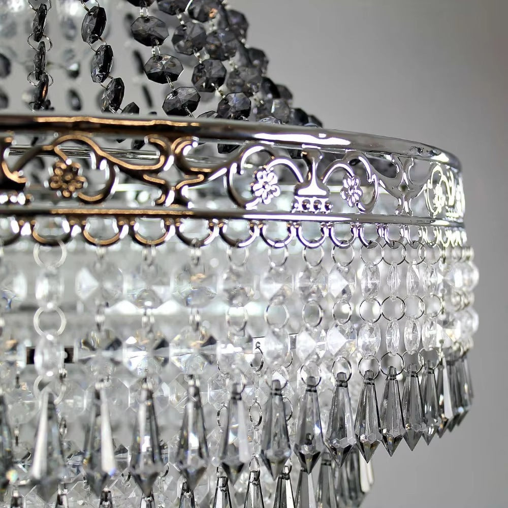 Close up of the chased chrome crown with scrolling foliage Image
