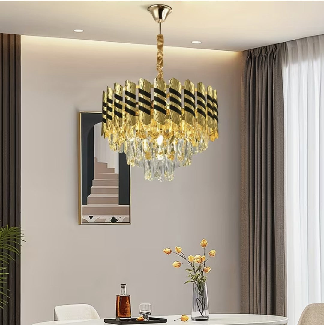 Black and gold crystal chandelier above a dining table