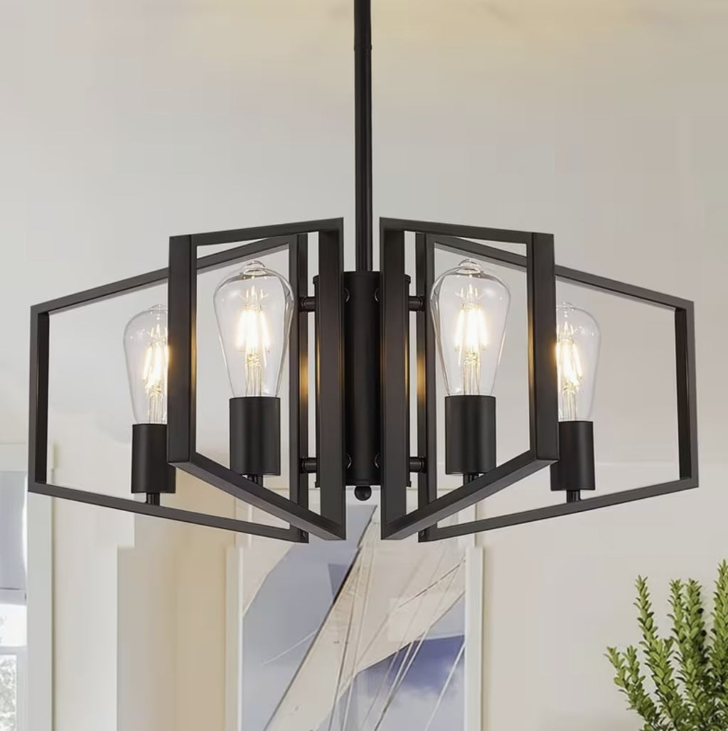Black iron chandelier above a dining table