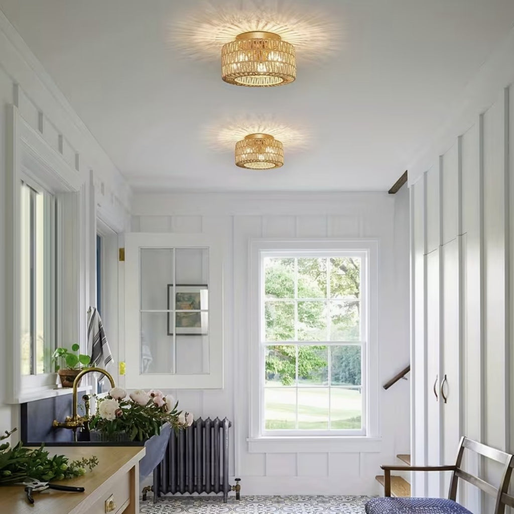 Two natural boho flush mount ceiling lights in a bright mudroom