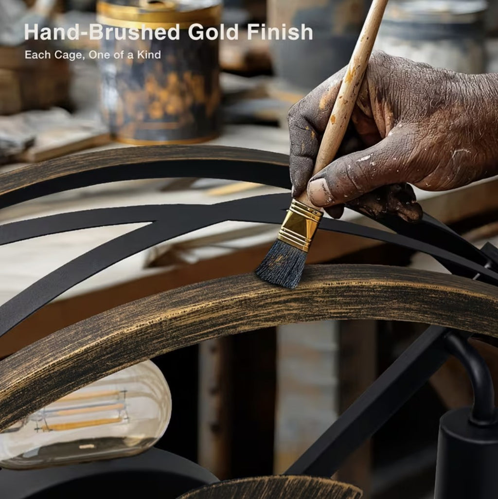 Hand-brushed gold finish applied on the cage with a brush