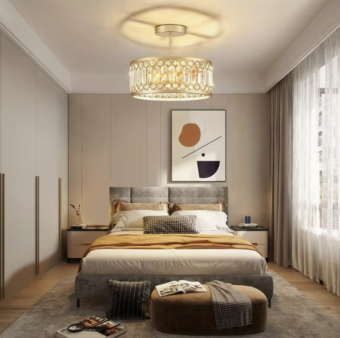 Gold crystal flush mount ceiling light in a bedroom