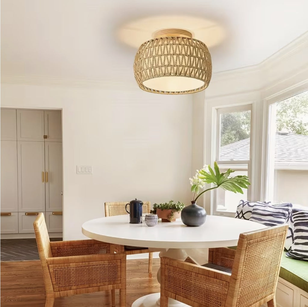 Farmhouse flush mount ceiling light above a round dining table