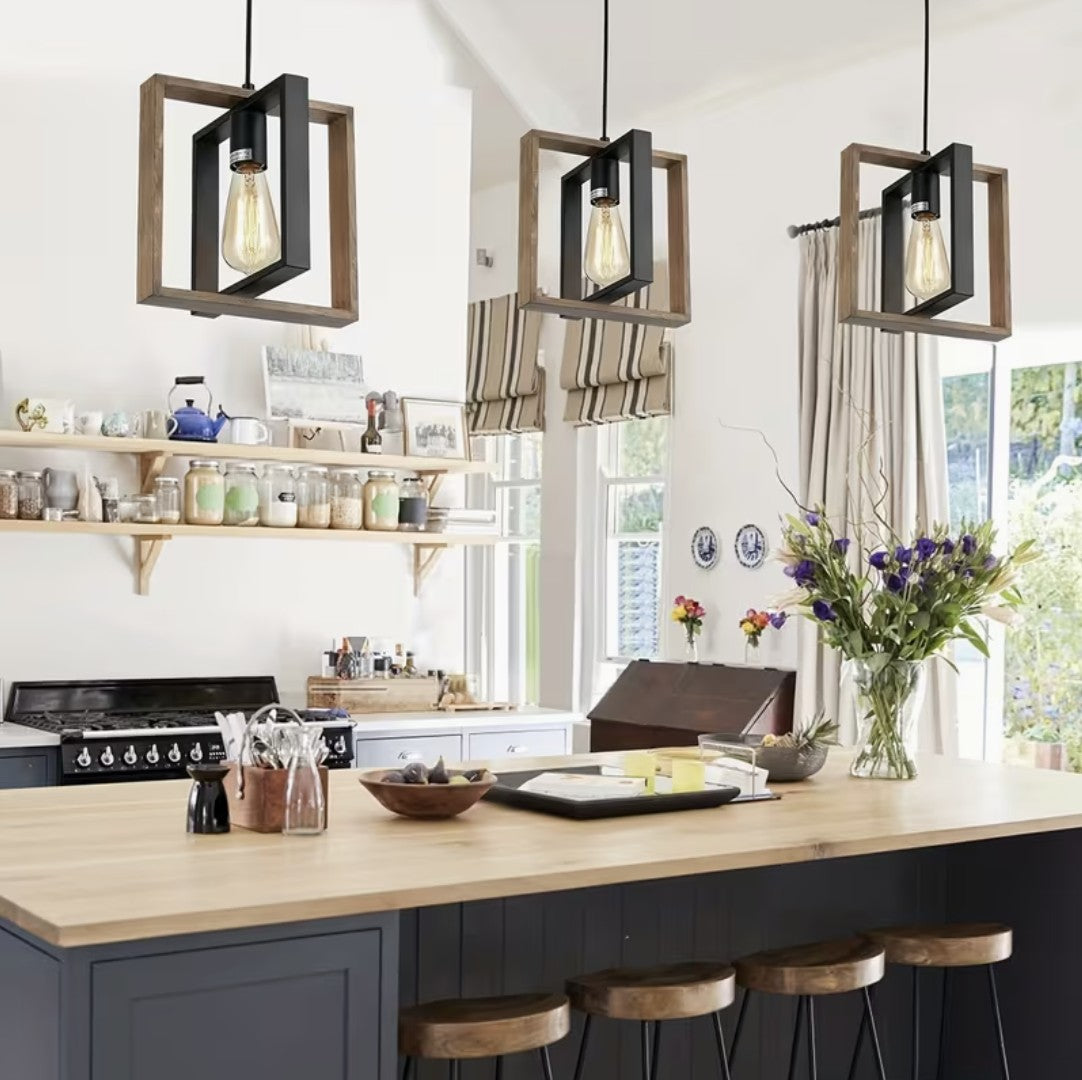 Farmhouse pendant lights above a wooden kitchen island