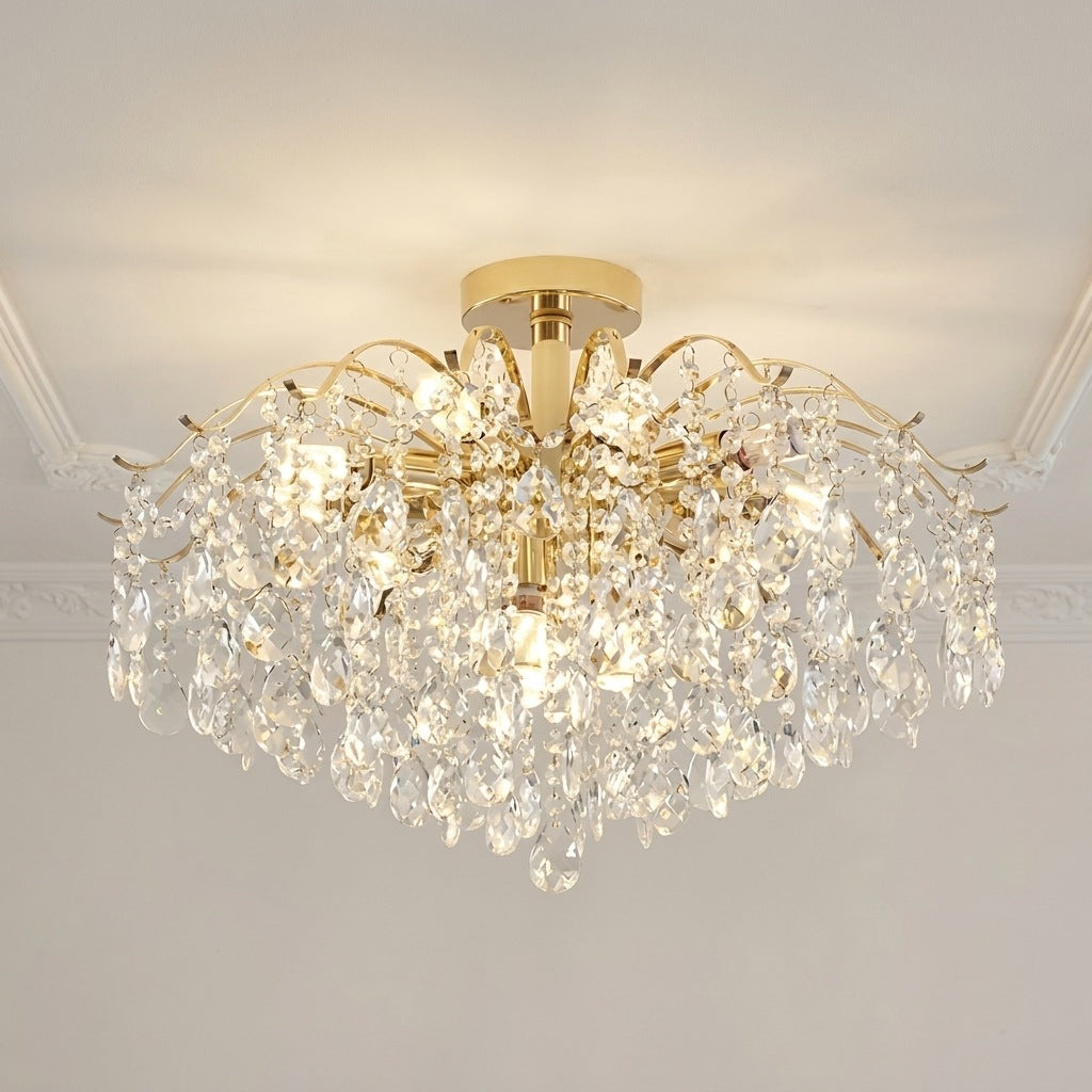 Gold crystal flush mount ceiling light with 12 lights, 23.6 inches wide, on a moulded ceiling Image