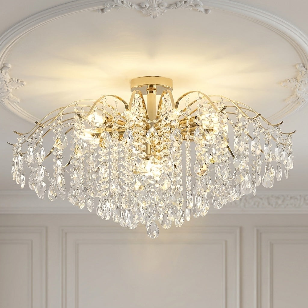 Gold crystal flush mount ceiling light with 14 lights, 31.5 inches wide, on a moulded ceiling Image