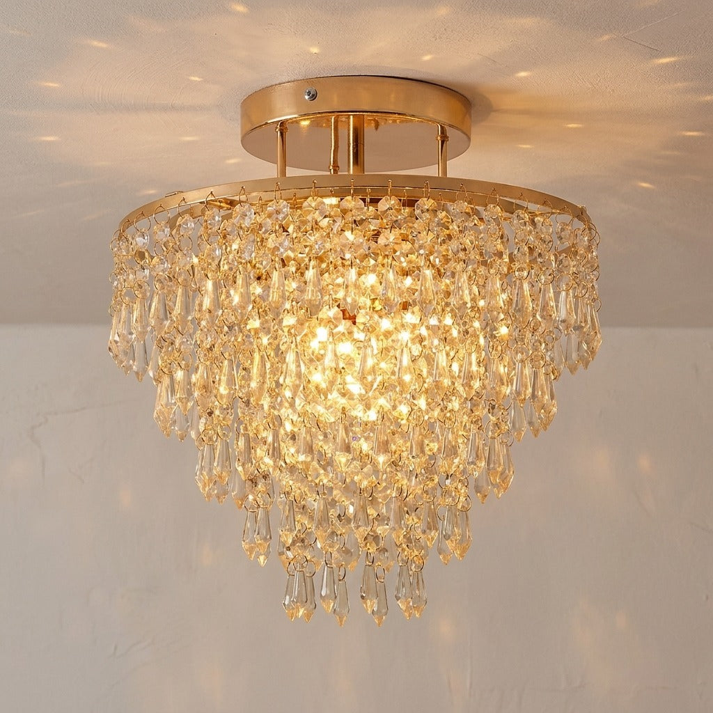 Close-up of the four crystal tiers of the gold crystal chandelier ceiling light Image