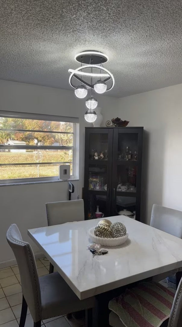 Customer photo, white globe chandelier above a dining table