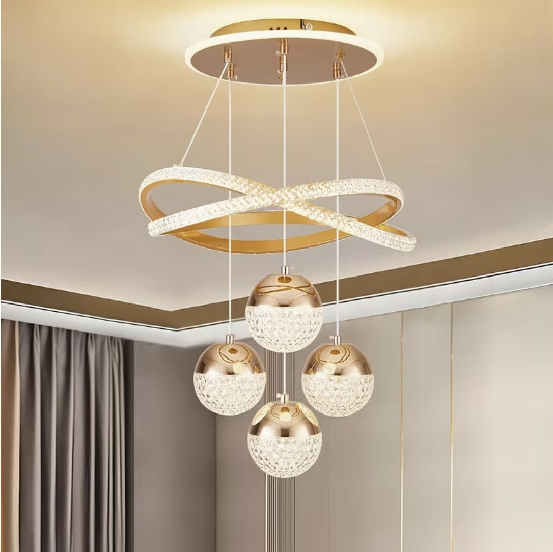 Gold LED globe chandelier with four crystal globes Image