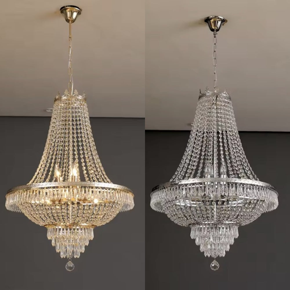 Large empire crystal chandelier shown side by side in gold and in silver