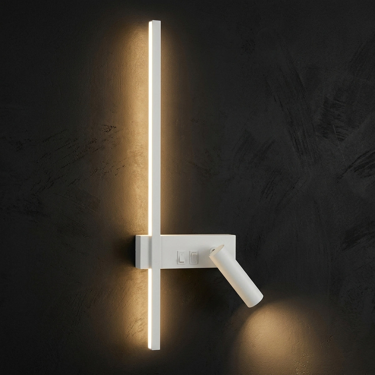 White LED bar wall sconce with an adjustable reading spotlight, switched on against a black plaster wall