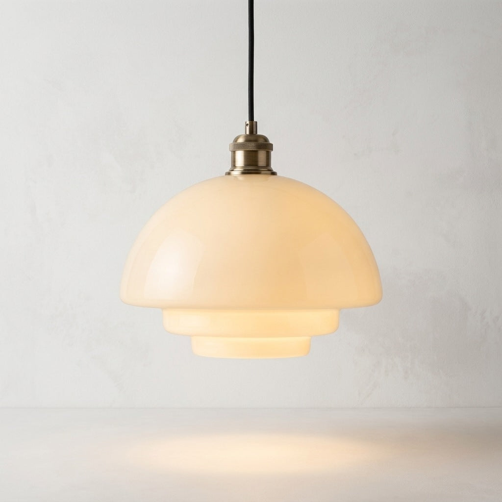 Milk glass pendant light, rounded dome profile, 11 inches wide, lit