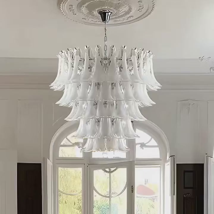 Luxury Murano glass chandelier turning, unlit then lit