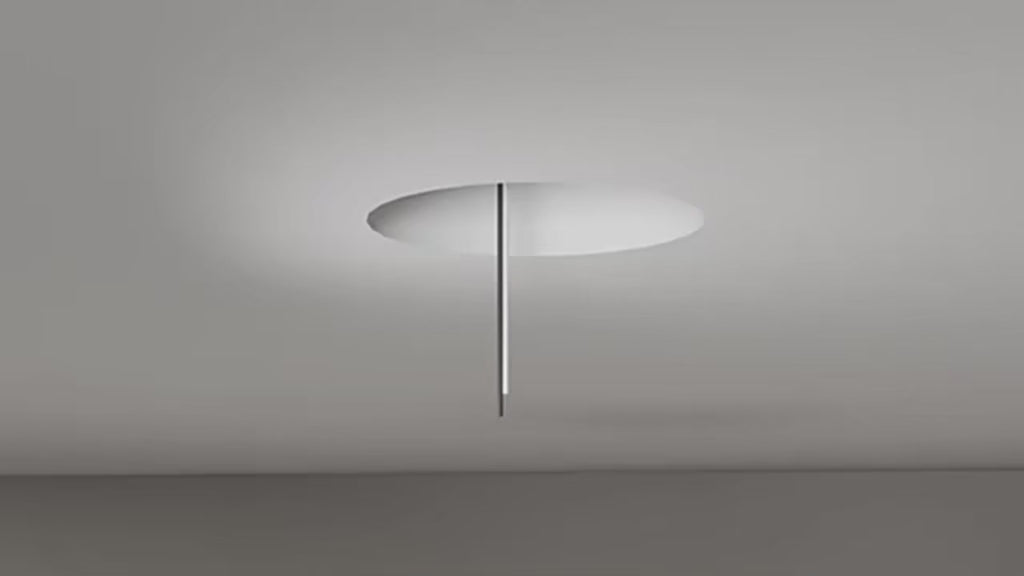 Wood caged ceiling fan with light running through its six speeds