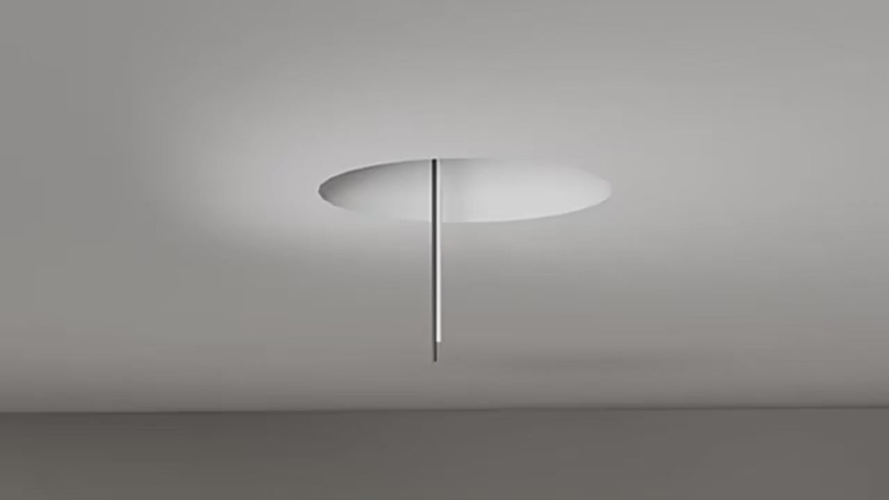 Wood caged ceiling fan with light running through its six speeds