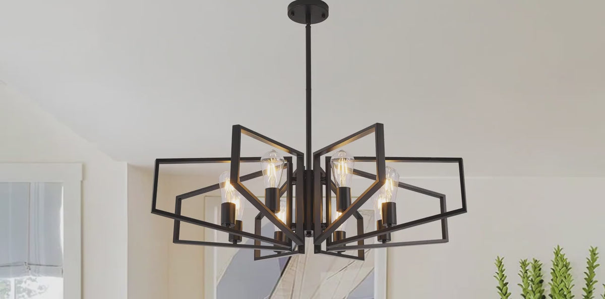 Black iron geometric chandelier assembled and lit