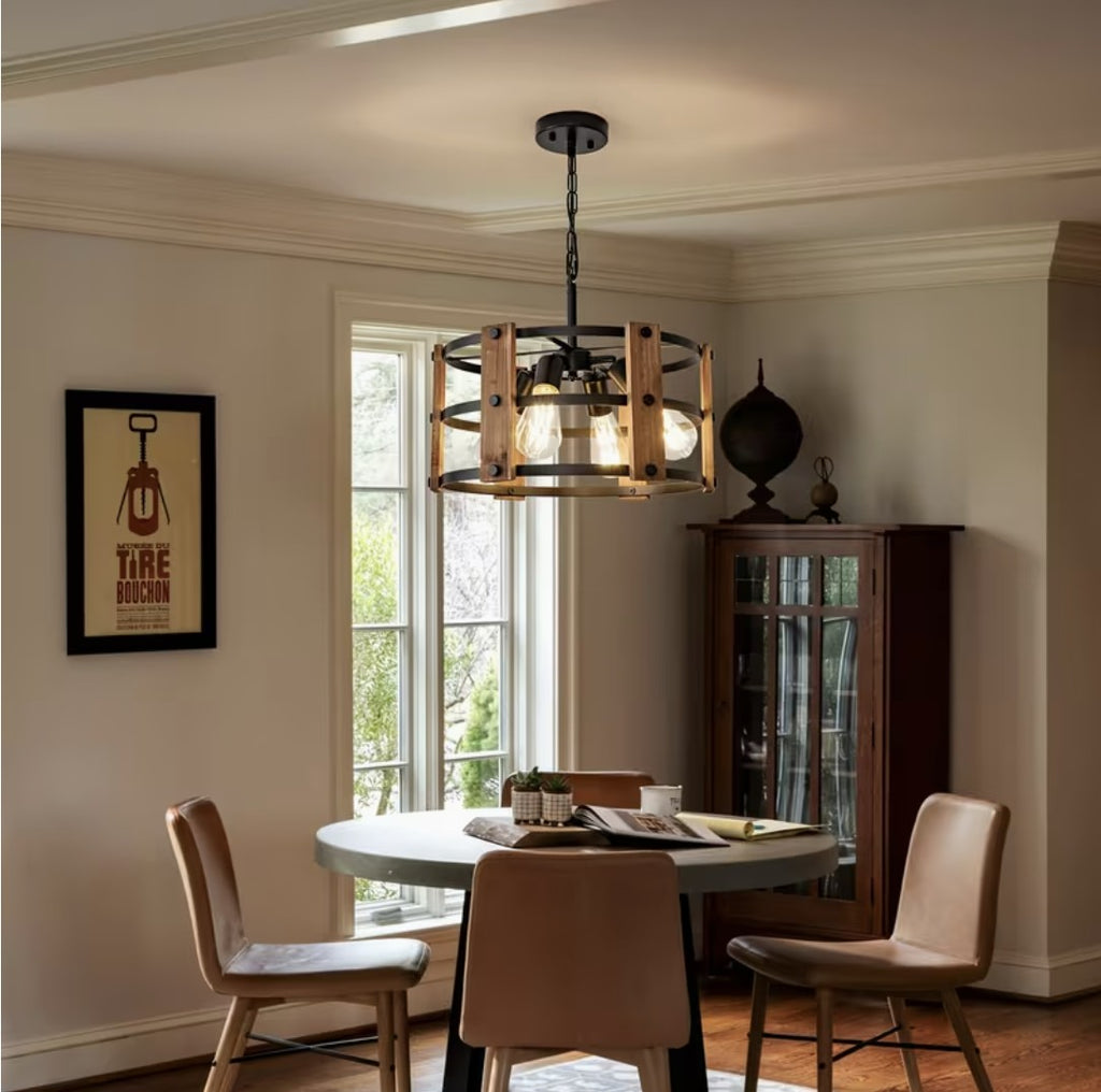 Walnut and black farmhouse chandelier above a round dining table