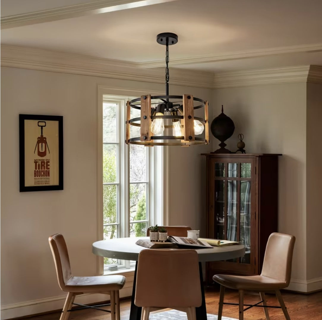 Walnut and black farmhouse chandelier above a round dining table