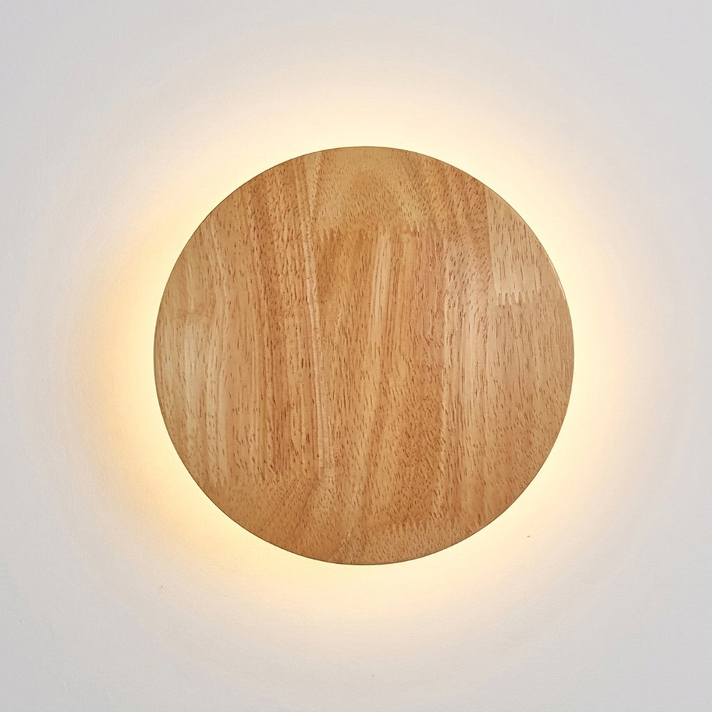 Round wood LED wall lamp, switched on
