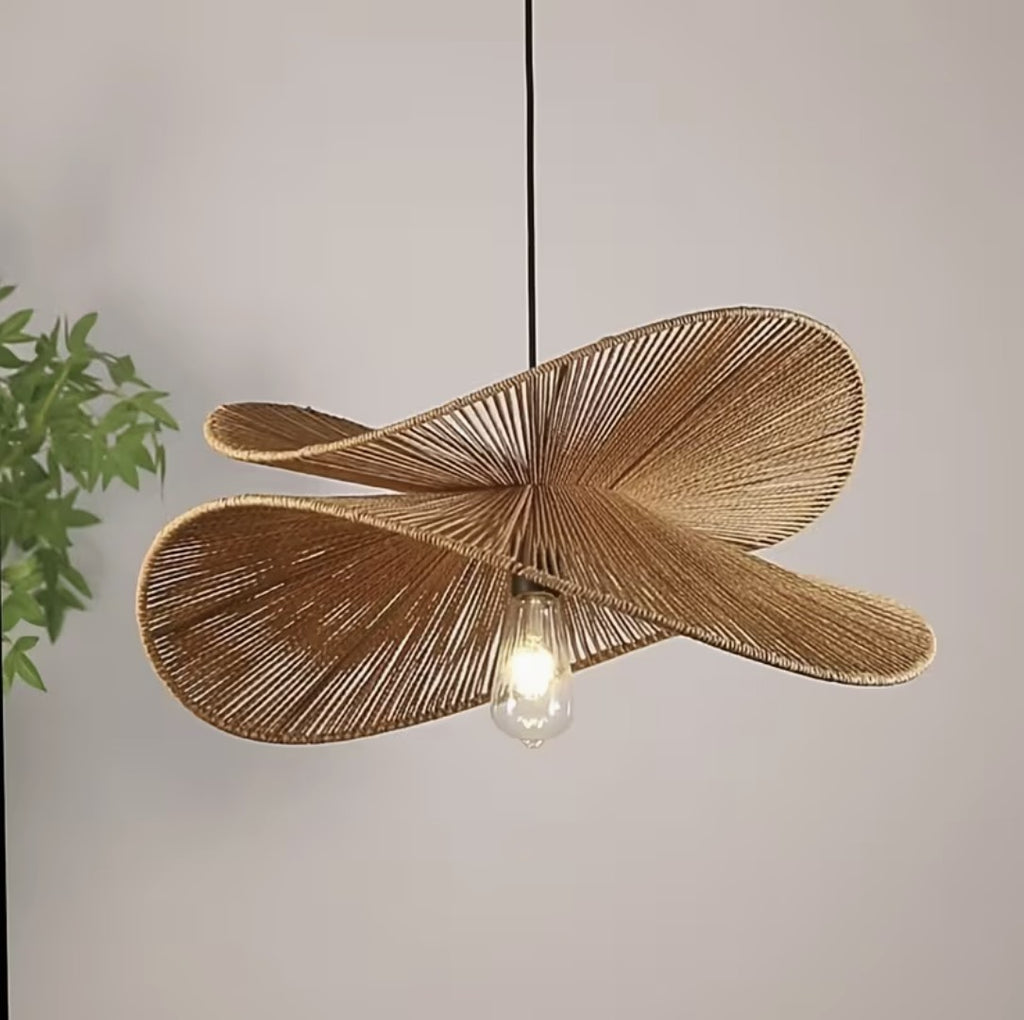 Boho woven pendant light with two natural cord discs, lit
